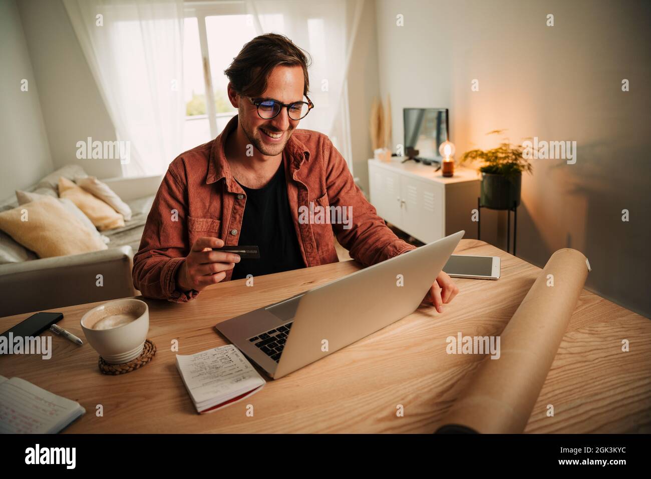Caucasian male business man working from home typing on laptop making ...