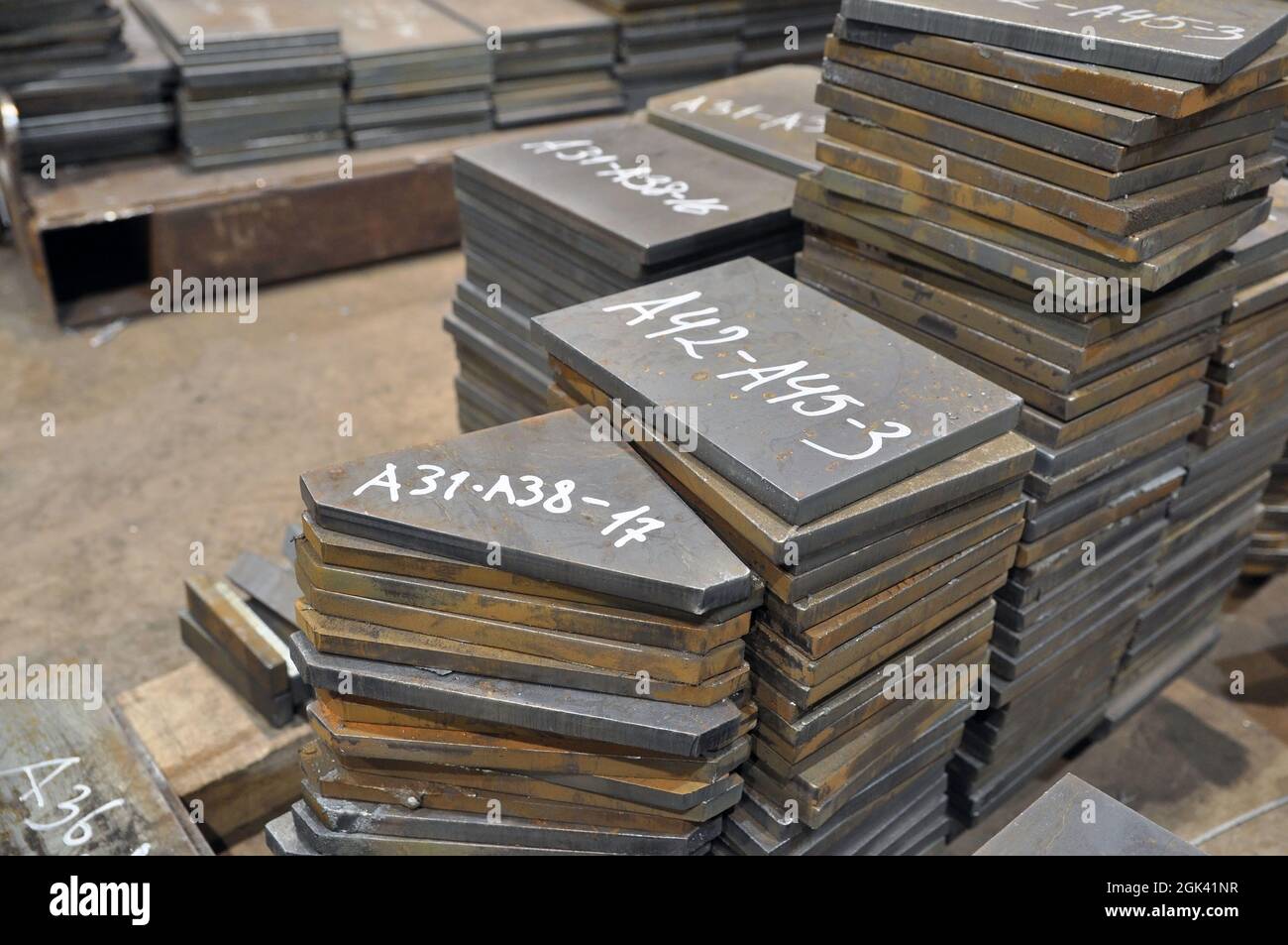 Metal cutting. Warehousing of finished parts with marking. Stock Photo