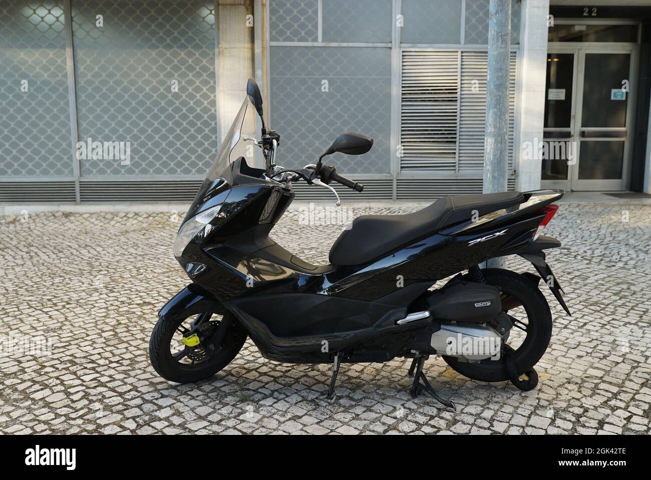 LISBON, PORTUGAL - Aug 02, 2021: A Honda PCX motorbike in a sidewalk in  Lisbon, Portugal Stock Photo - Alamy