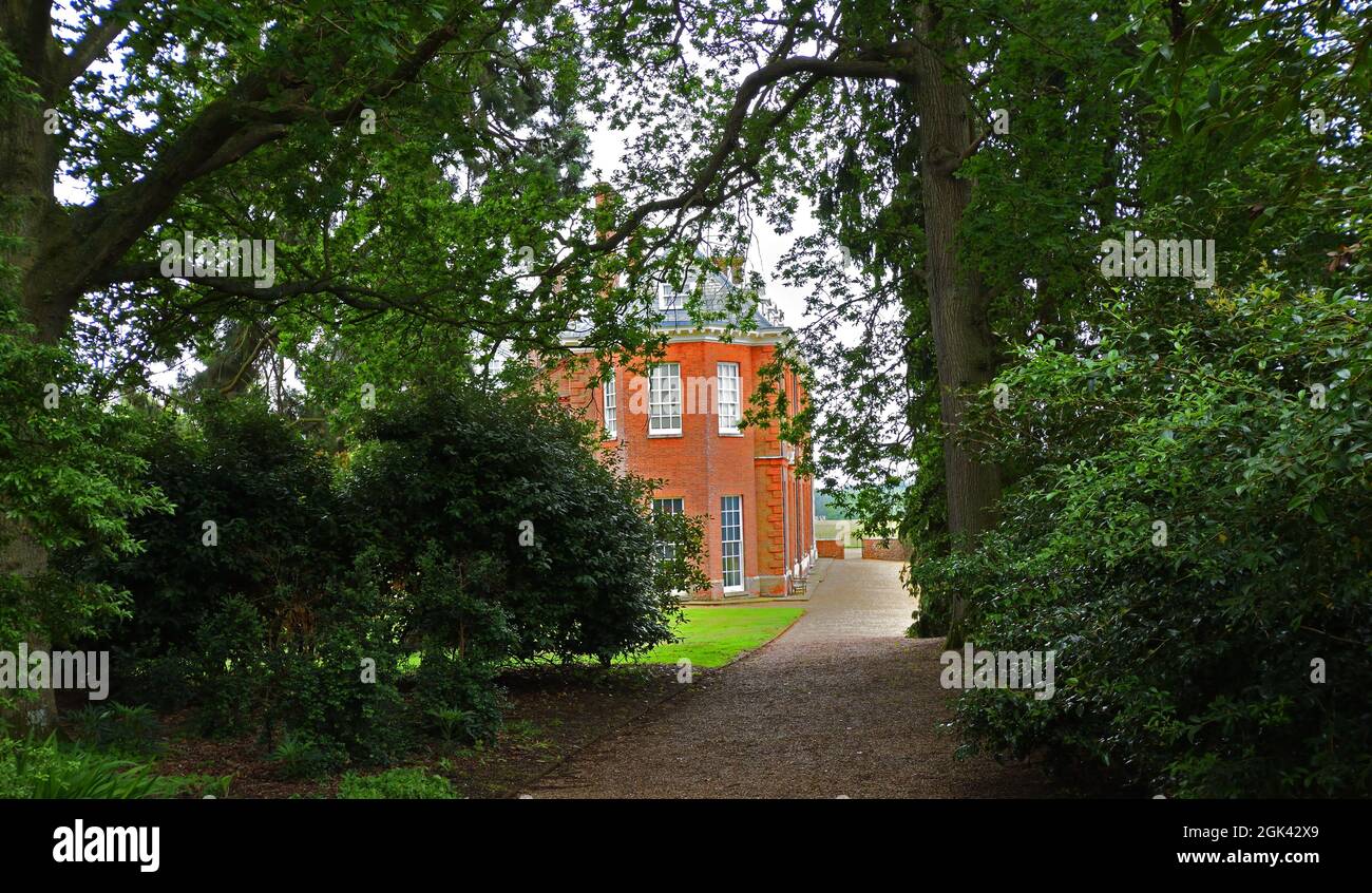 Felbrigg hall framed by trees Stock Photo