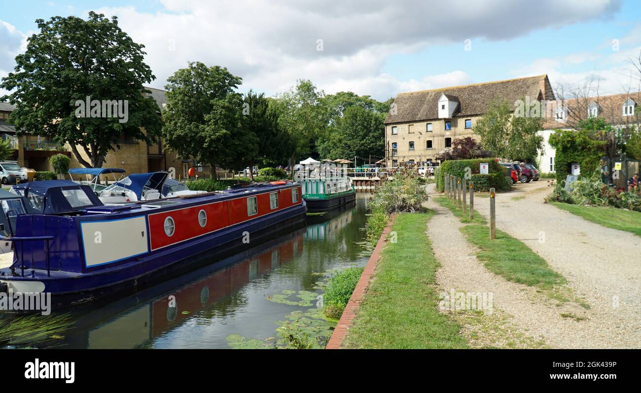 St Neots River Mill and Marina with moored narrow boats. Stock Photo