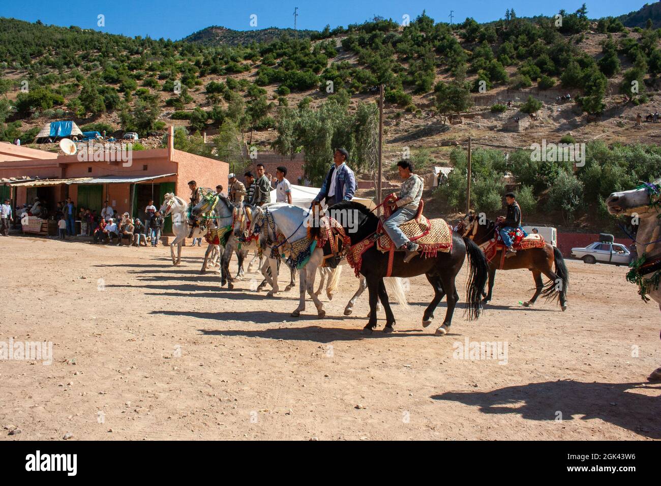 Horse riders in Festival Fantasia in rural Morocco - a traditional Berber spectacle of horsemanship Stock Photo