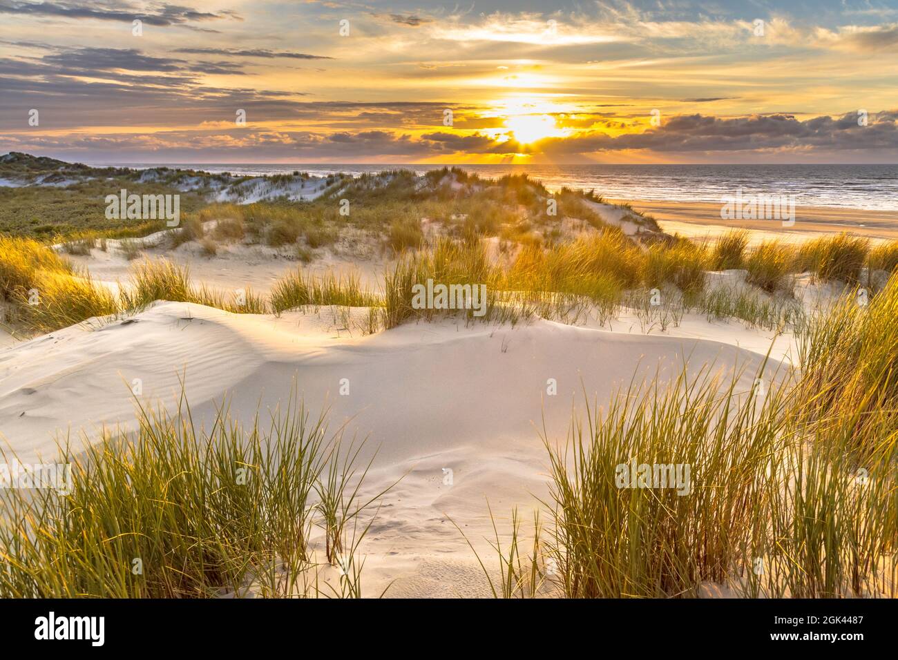 Sunset View from dune top over North Sea from the island of Ameland, Friesland, Netherlands Stock Photo