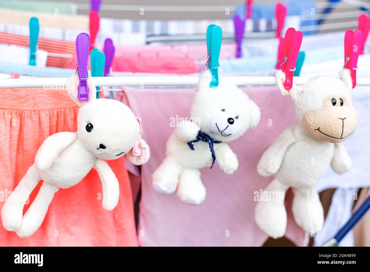The soft toys are dried in a dryer Stock Photo Alamy