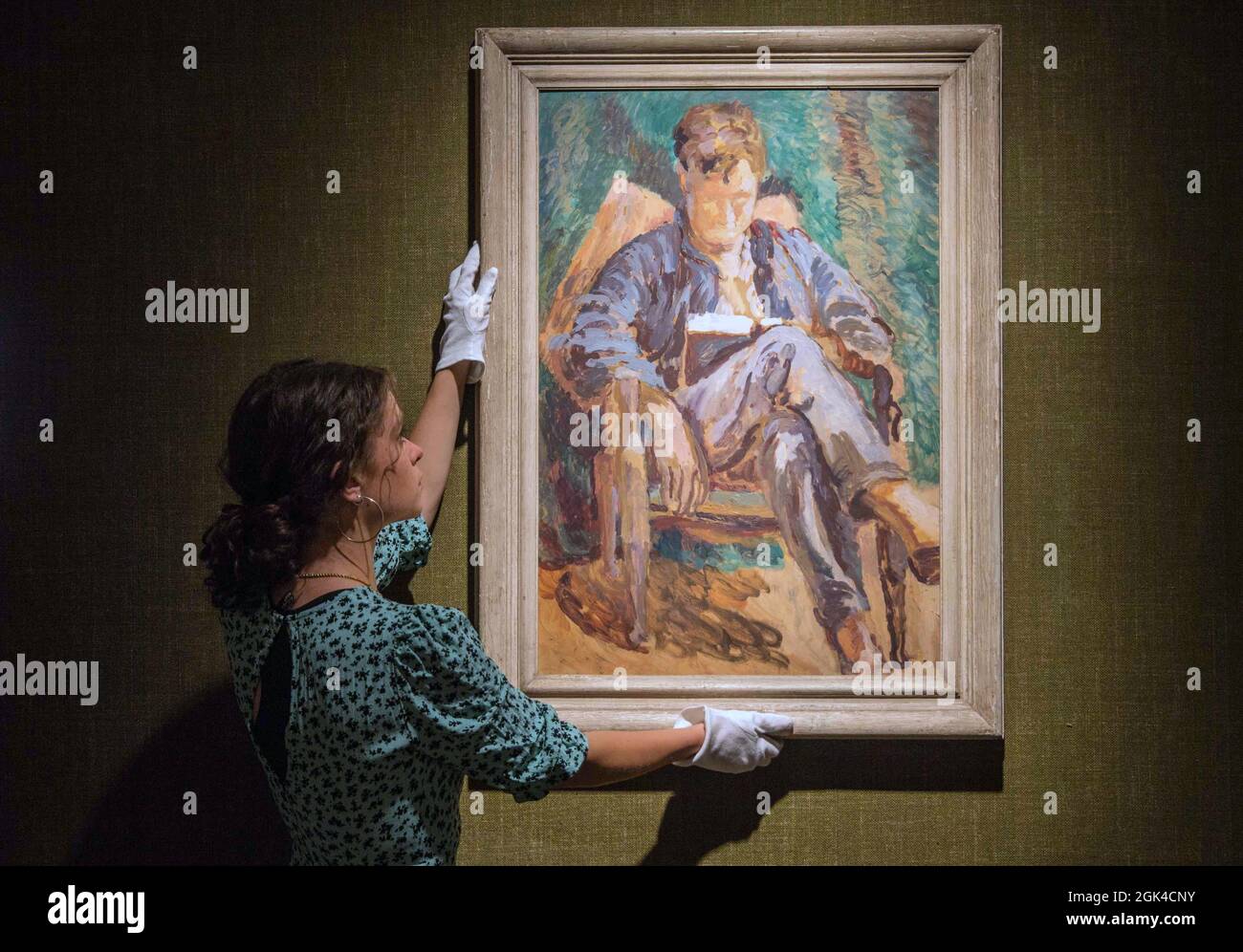 London UK 13 September  2021 Duncan Grant  Julian Bell Reading, 1930. The Bloomsbury Group’s rural haven in the folds of the Sussex Downs became a compelling subject in itself.   Paul Quezada-Neiman/Alamy Live News Stock Photo