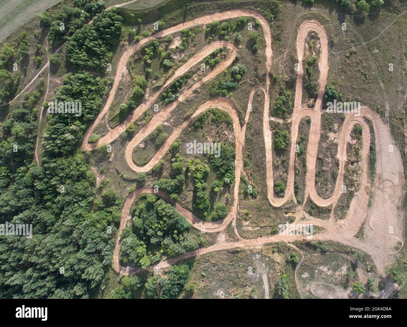 Dirty road motocross track above top drone view Stock Photo