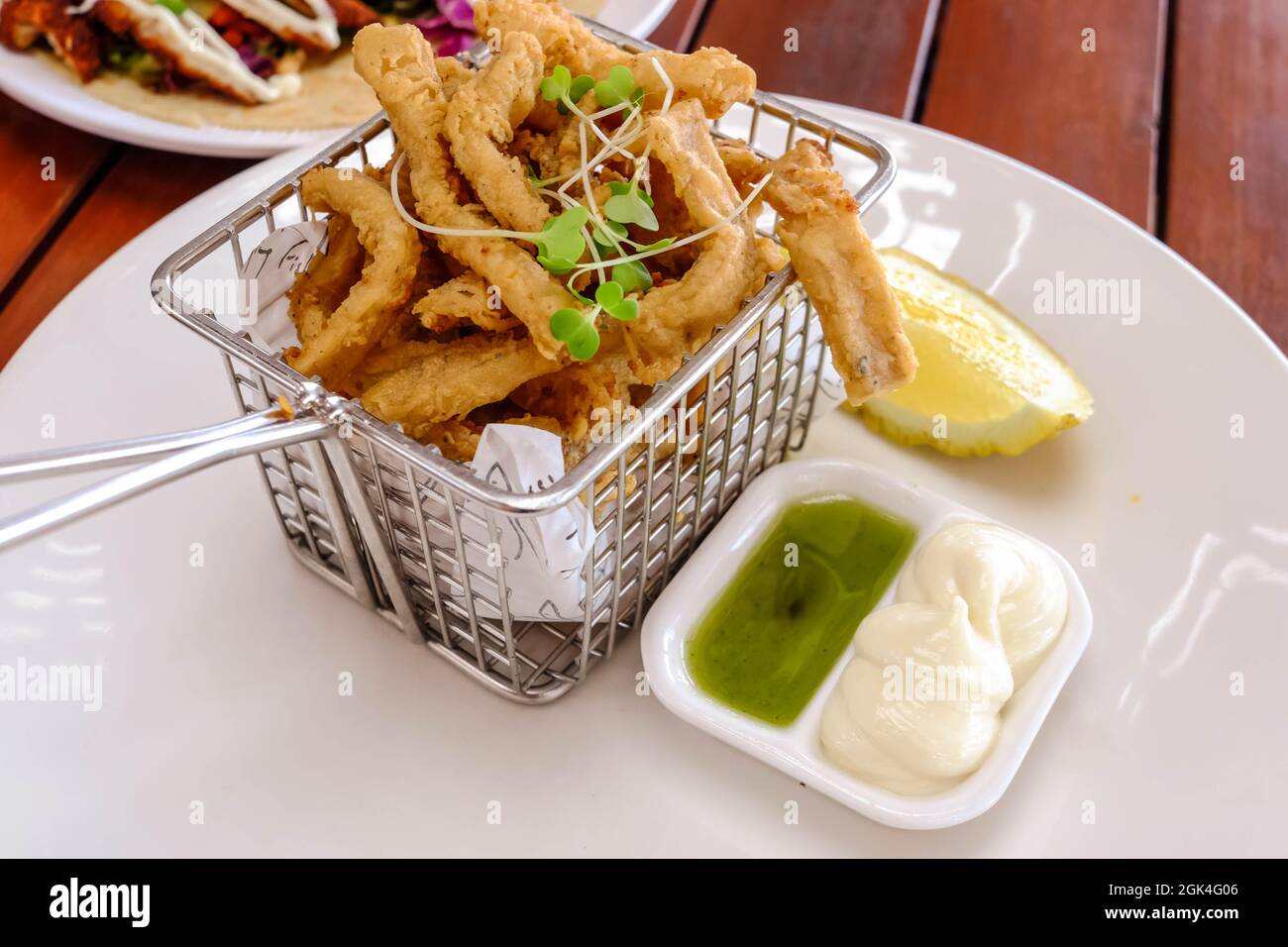 Deep fried calamari with mayonnaise dip Stock Photo Alamy