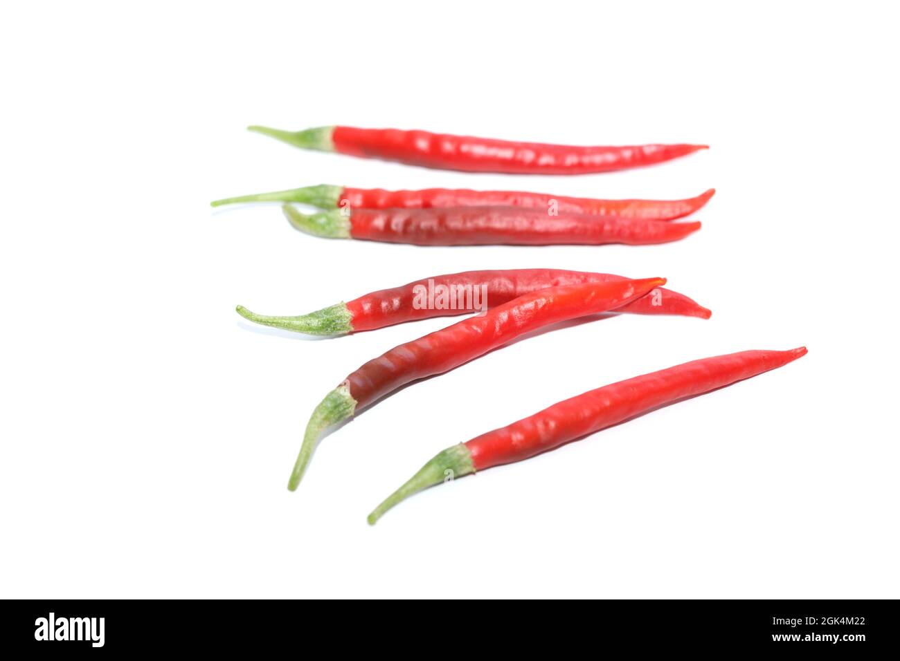 Red hot chili peppers isolated on white Stock Photo - Alamy