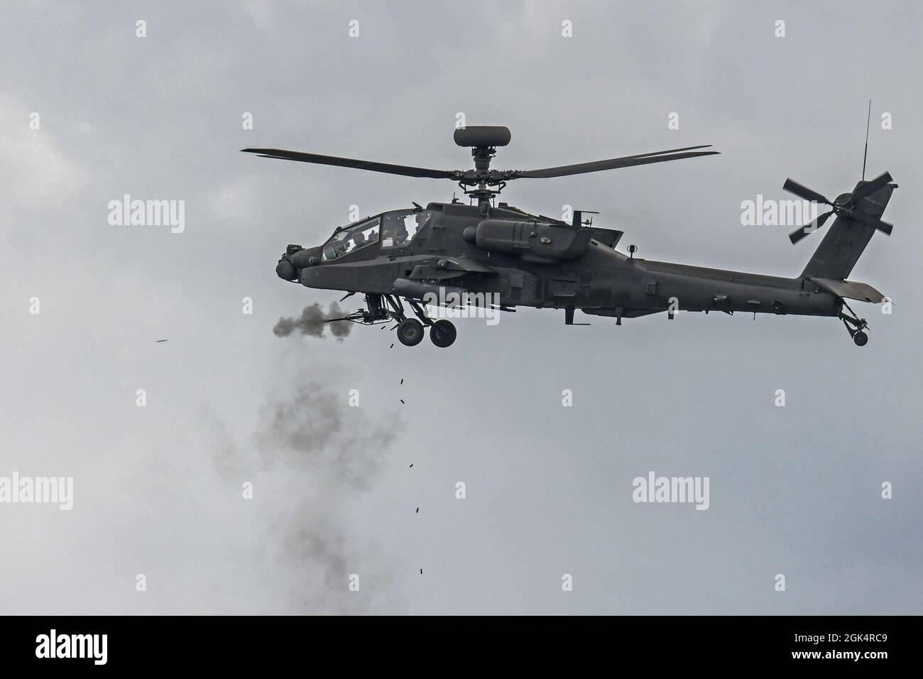 U.S. Soldiers, assigned to 1st Combat Aviation Brigade, 1st Infantry Division,  conduct aerial gunnery training flying in a AH-64D Apache Longbow attack helicopter at the 7th Army Training Command's Grafenwoehr Training Area, Germany, Aug. 4, 2021. Stock Photo