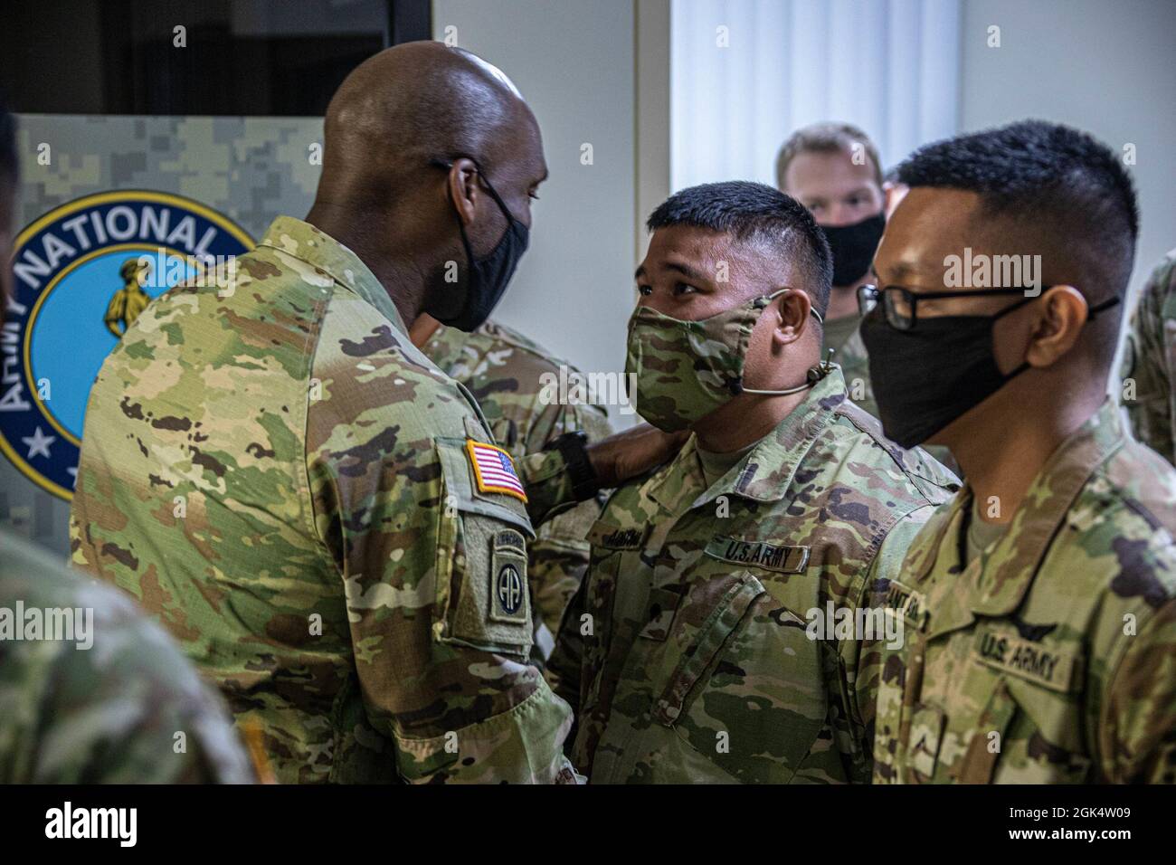 Maj. Gen. Xavier T. Brunson, the I Corps commanding general, presents a