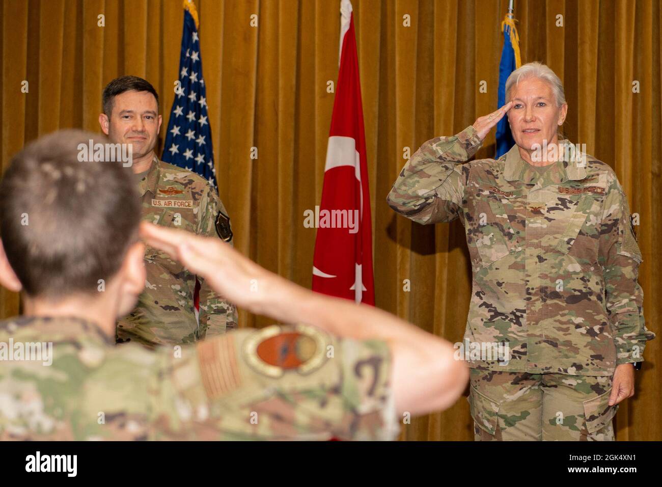 Col. Angela Herron, 39th Mission Support Group commander, renders her first salute as commander during an assumption of command ceremony at Incirlik Air Base, Turkey, Aug. 2, 2021. Col. John Kelly, 39th Air Base Wing vice commander, presided over the assumption of command ceremony. Stock Photo