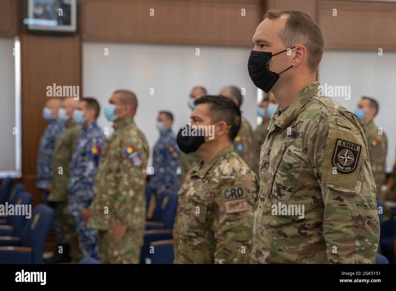 Sgt. Morgan Figgs (right), 377th Theater Sustainment Command, stands ...
