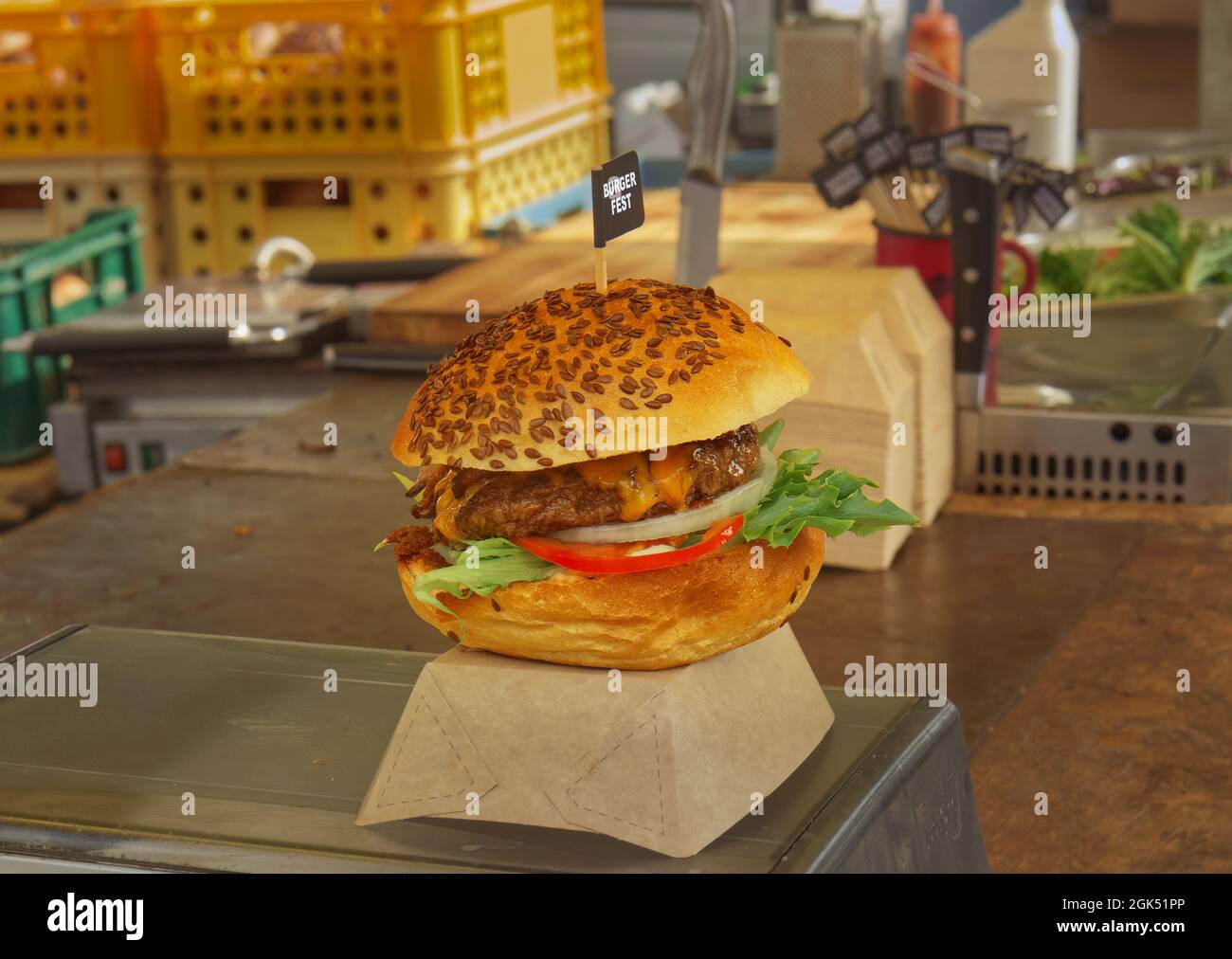 Freshly prepared burger on display attracts visitors to the farmers street  food and wine festival in Prague Stock Photo - Alamy