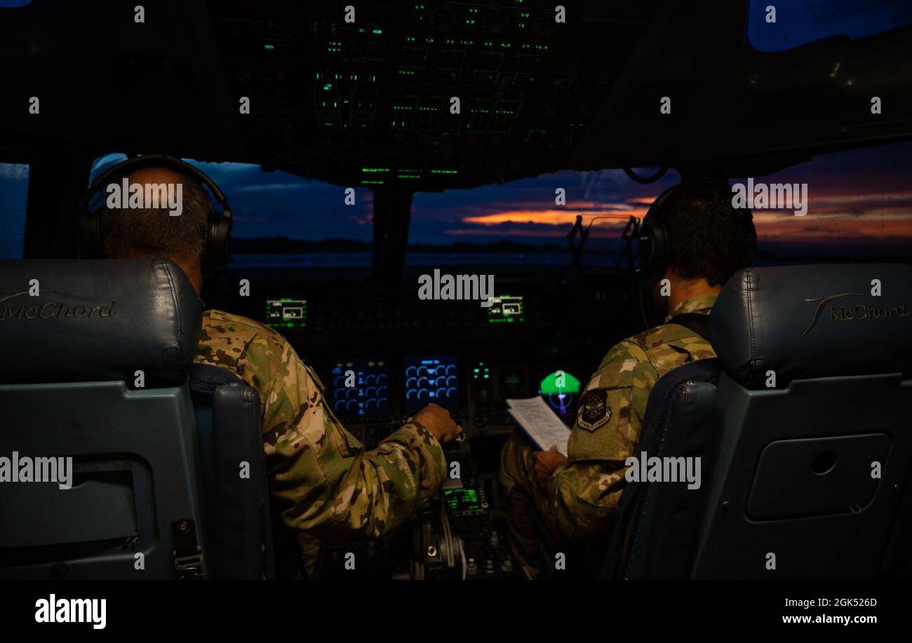 U.S. Air Force Lt. Col. Timothy Garland, left, a pilot with the 7th ...