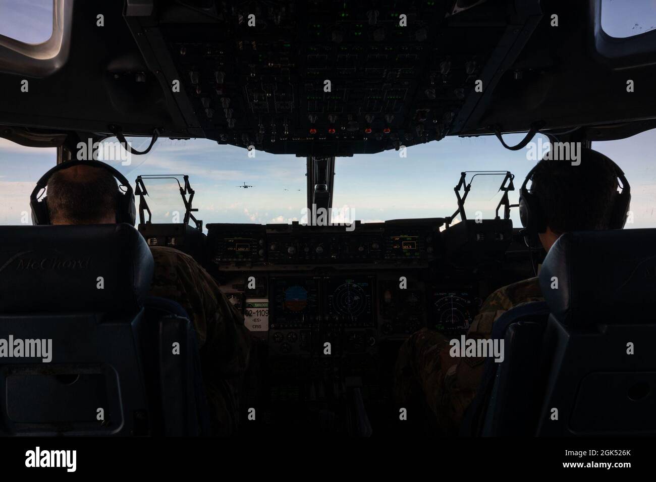 U.S. Air Force Lt. Col. Timothy Garland, left, a pilot with the 7th ...