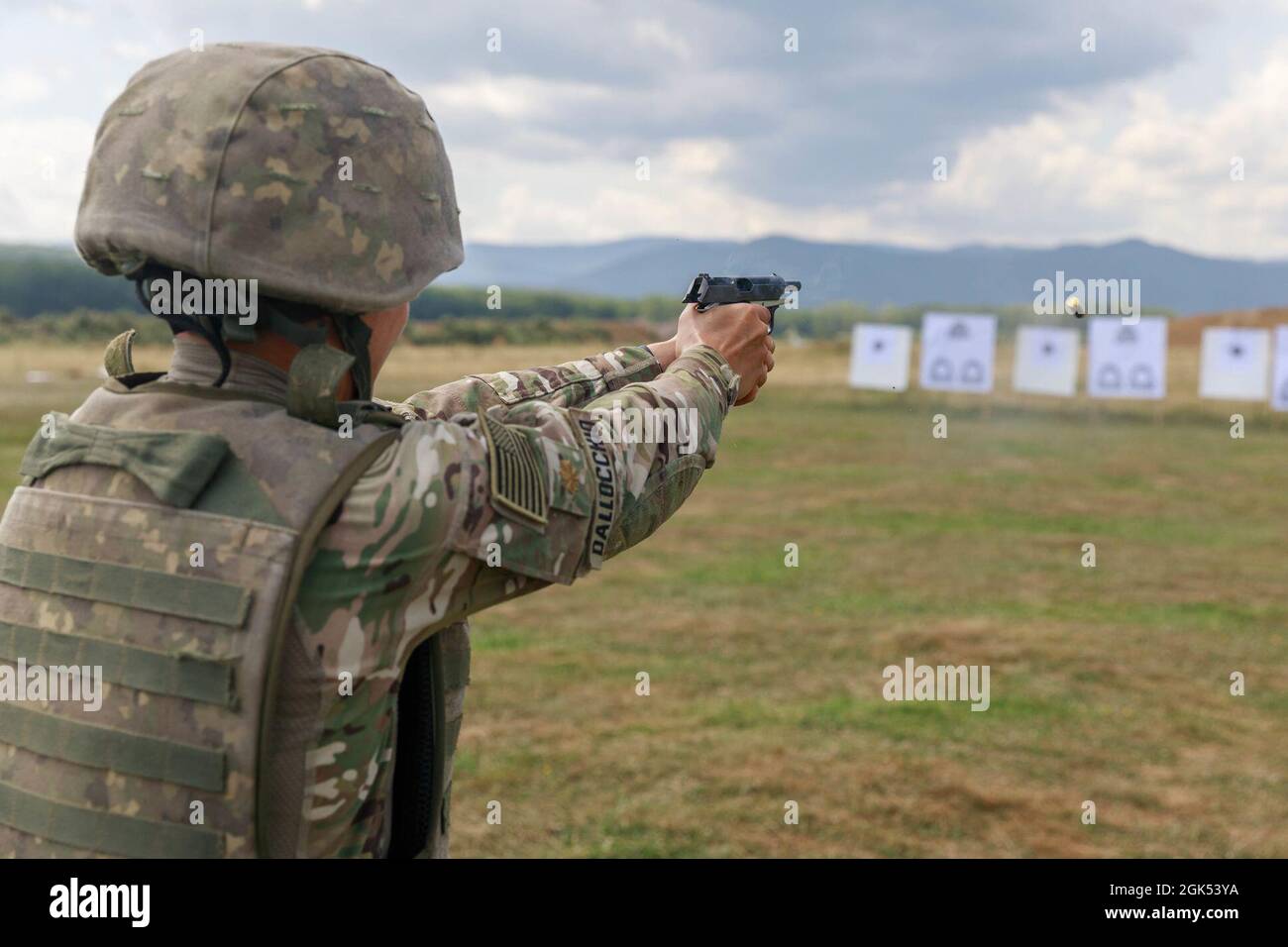 Maj. Nicole Dallocchio, U.S. Army Reserve Command, fires a Pistol Carpați  Md. 1974 during a training event in Sibiu, Romania, August 4. Reserve  Soldiers and Airmen have been invited to lead a