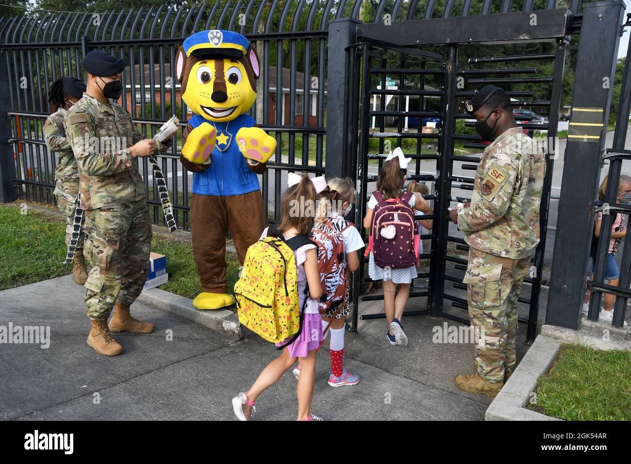 Members Of The 81St Security Forces Squadron And Chase The Paw Patrol Dog  Greet Military Children For The First Day Of School Near The Pedestrian  Gate At Keesler Air Force Base, Mississippi,