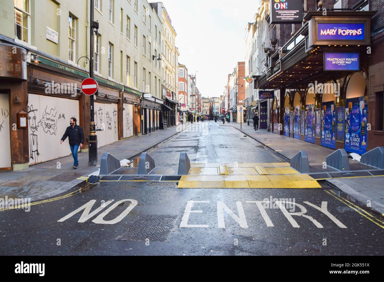 Closed restaurants and bars on an empty Old Compton Street during the national coronavirus