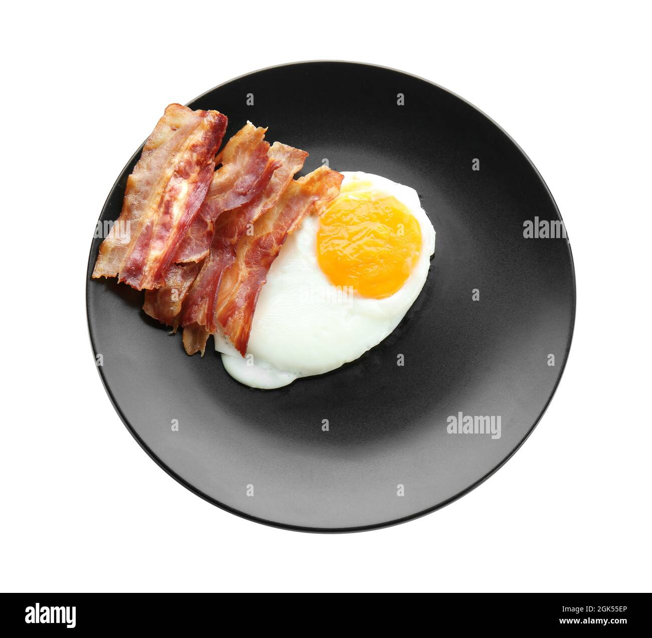 Plate with fried egg and bacon on white background Stock Photo - Alamy