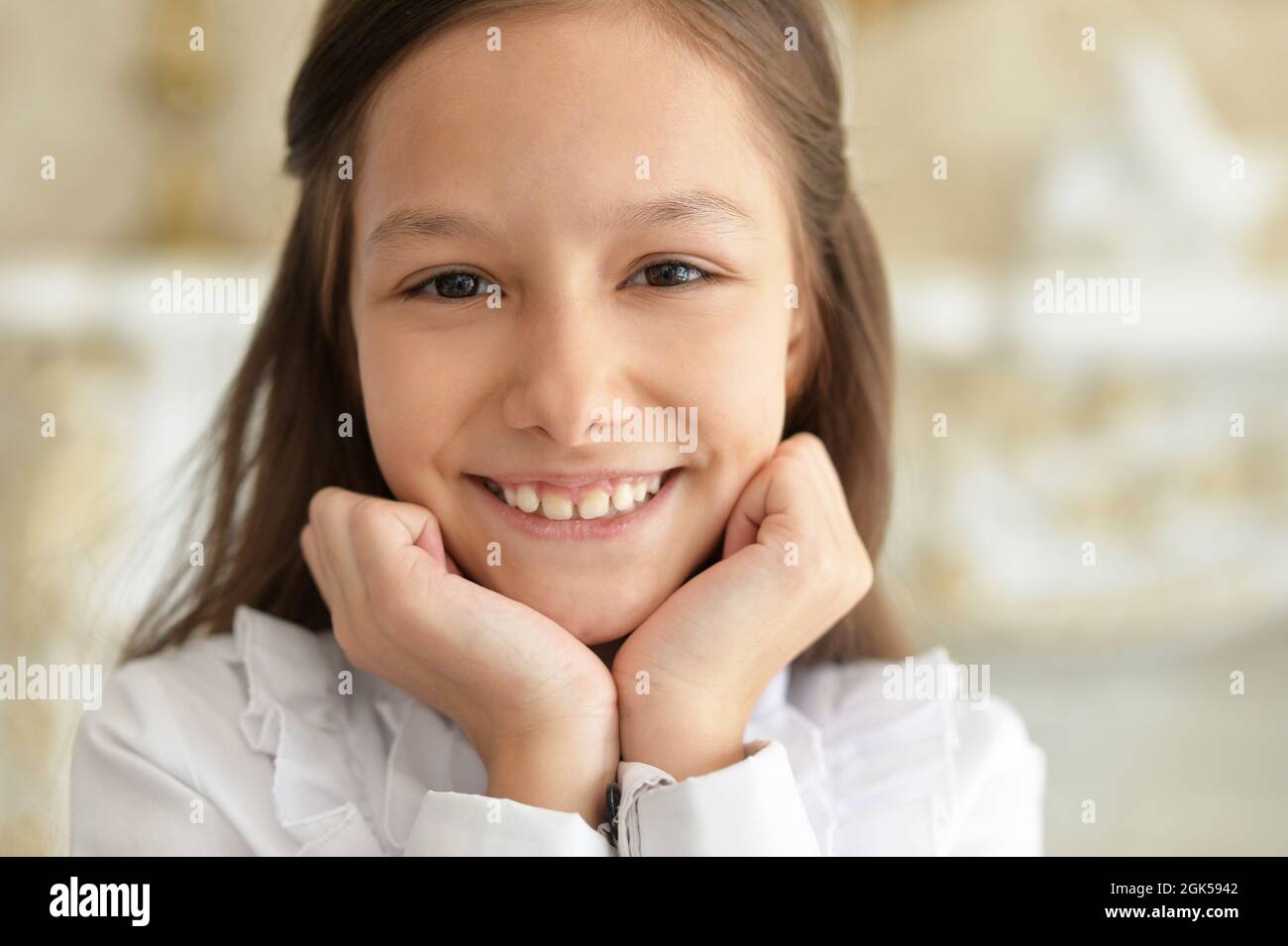 Close up portrait of emotional little girl in white blouse Stock Photo ...