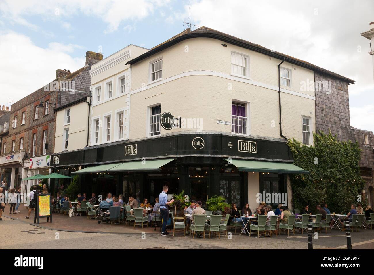Bill's Restaurant, on the corner with Bear Yard, at 56 Cliffe High St, Lewes BN7 2AN. East Sussex. UK. The first ever Bill's was Lewes. (127) Stock Photo