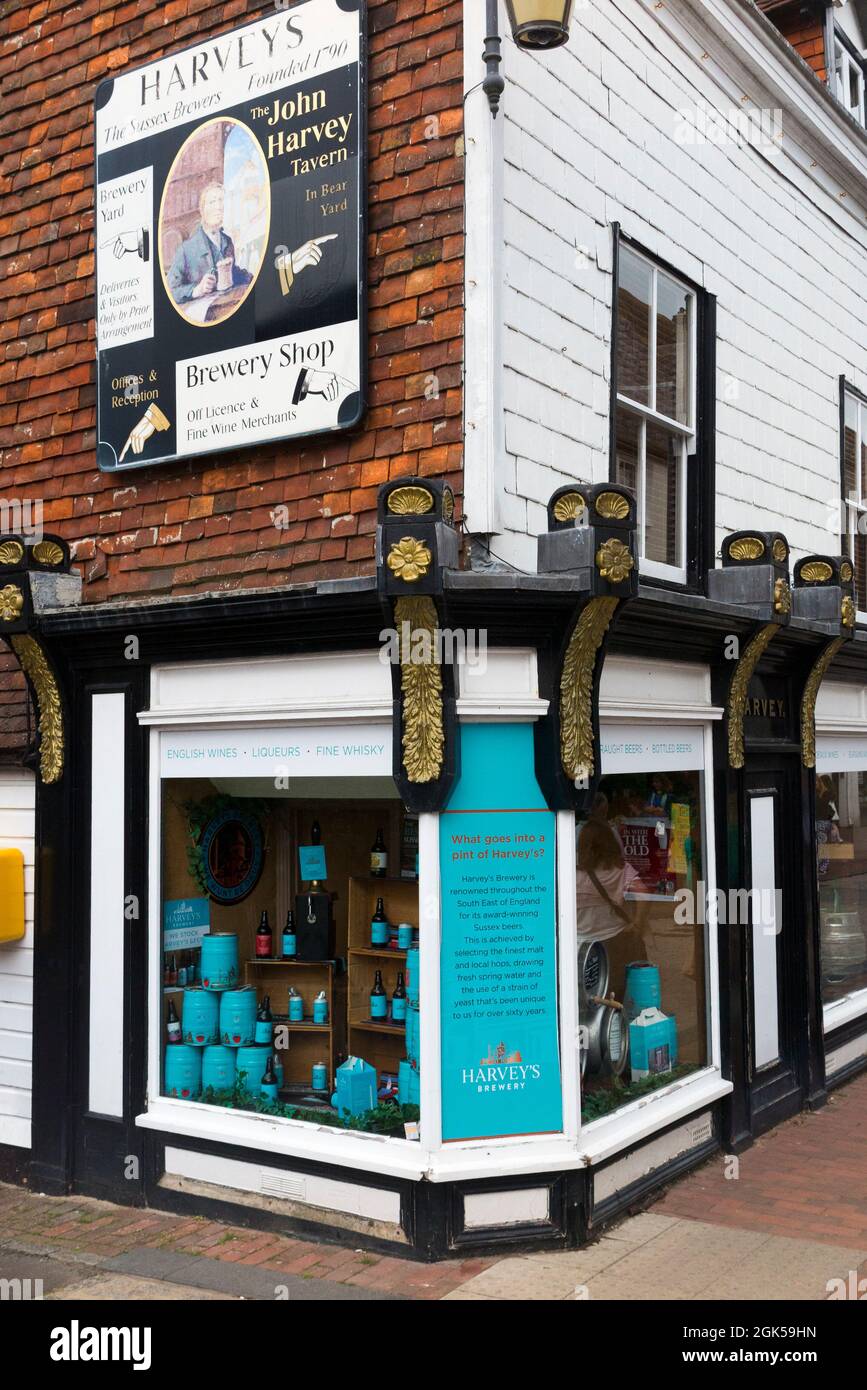 Shopfront & window with can / cans / beer on sale at Harvey's brewery shop, Cliffe High Street, Lewes. UK. Customers can buy directly from brewery. (127) Stock Photo