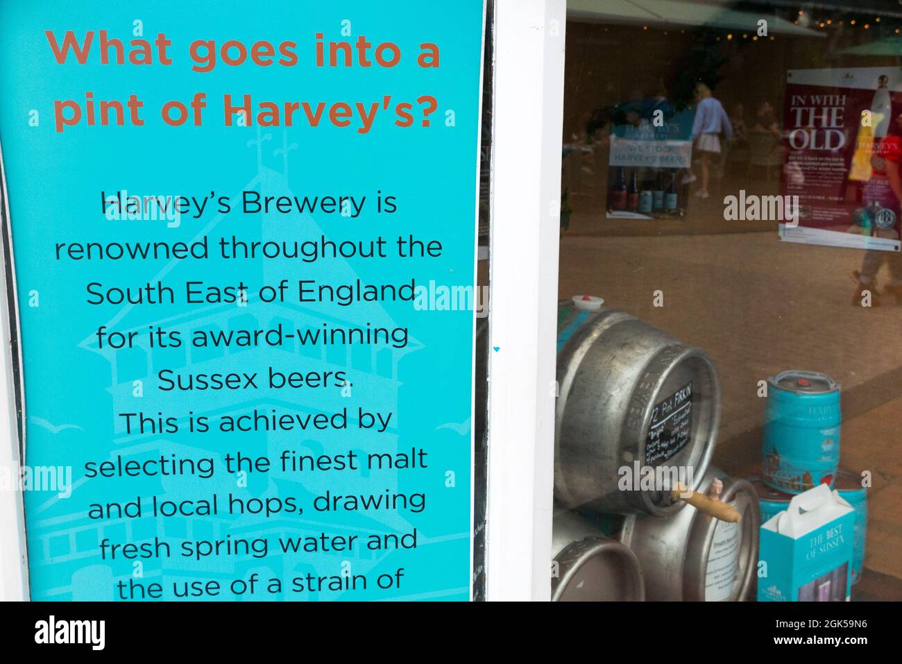 Shopfront & window with can / cans / beer on sale at Harvey's brewery shop, Cliffe High Street, Lewes. UK. Customers can buy directly from brewery. (127) Stock Photo