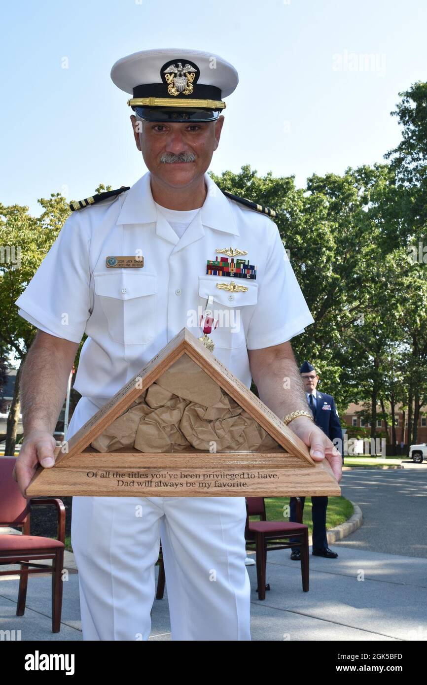 COLTS NECK, New Jersey -- Naval Weapons Station Earle held a retirement  ceremony for Executive Officer Lt. Cmdr. Jack L. Smock Jr. Aug 6. Smock, a  naitive of Peterstown, West Virginia, served