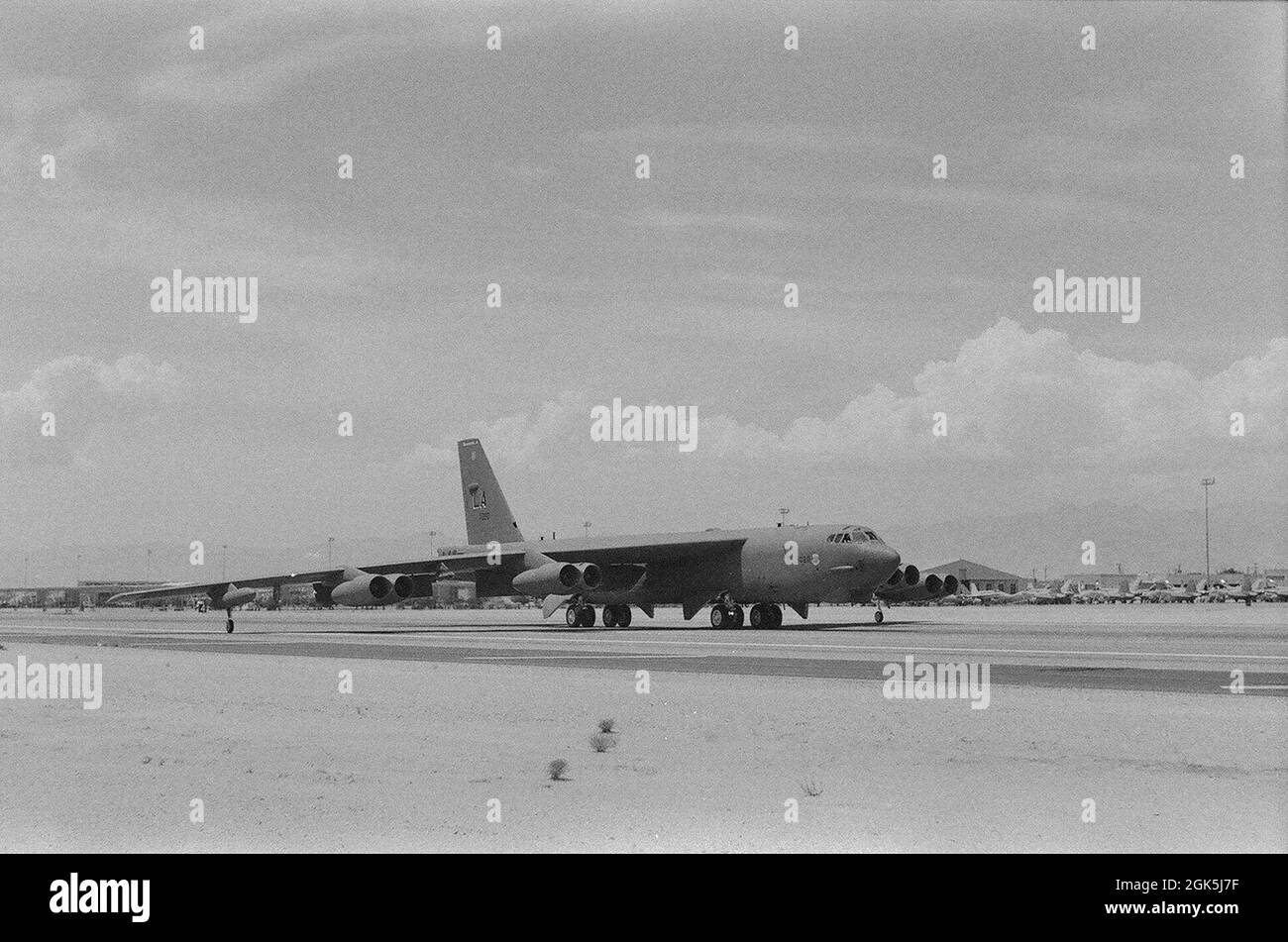A B-52H Stratofortress bomber assigned to the 340th Weapons Squadron at Barksdale Air Force Base, Louisiana, taxis down the runway during Red Flag 21-3 at Nellis Air Force Base, Nevada, Aug. 4, 2021. Red Flag began in 1975 as an aerial-combat exercise but has evolved to include war-fighting across air, space and cyberspace domains. Prior to the invention of digital cameras, military members used film cameras to document combat missions dating all the way back to late 1800s. Stock Photo
