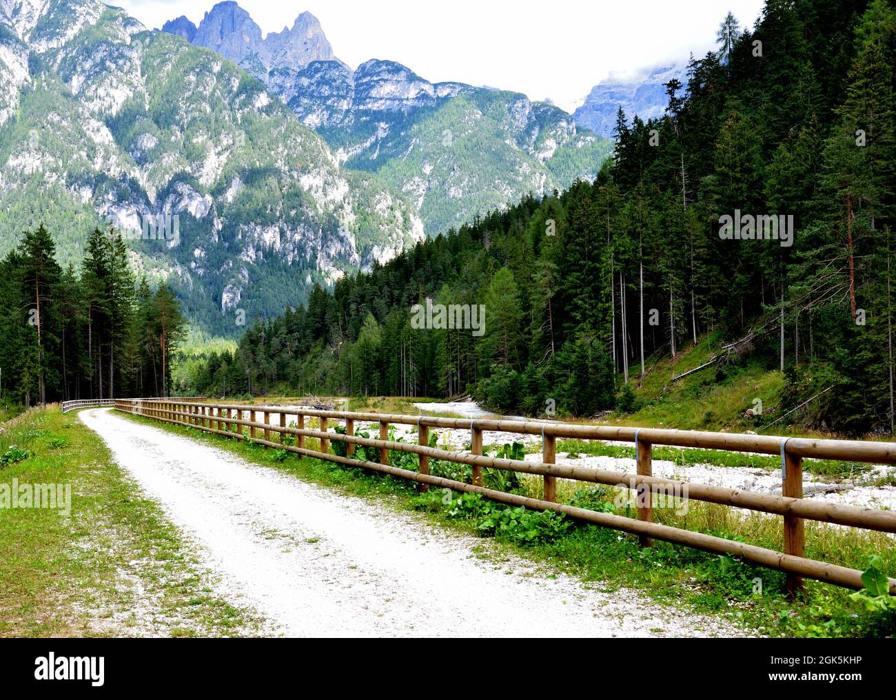 A cycle path has been set up in the Ansiei river valleythat connects the villages of Auronzo di Cadore and Misurina in complete safety Stock Photo