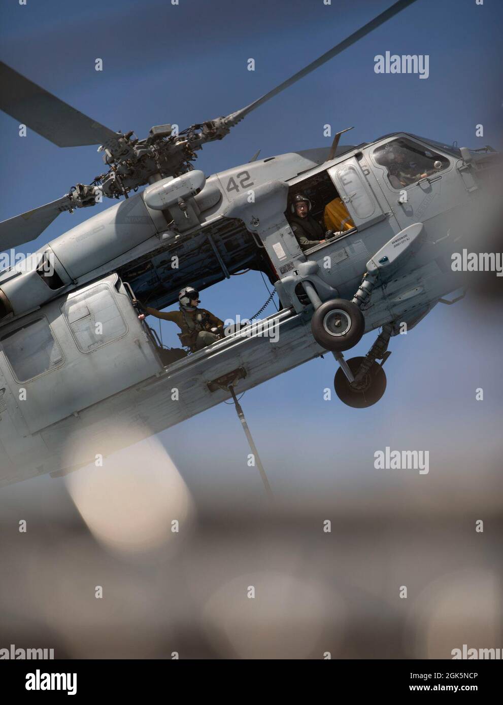 U.S. Navy pilots with Helicopter Sea Combat Squadron 28, transport ...