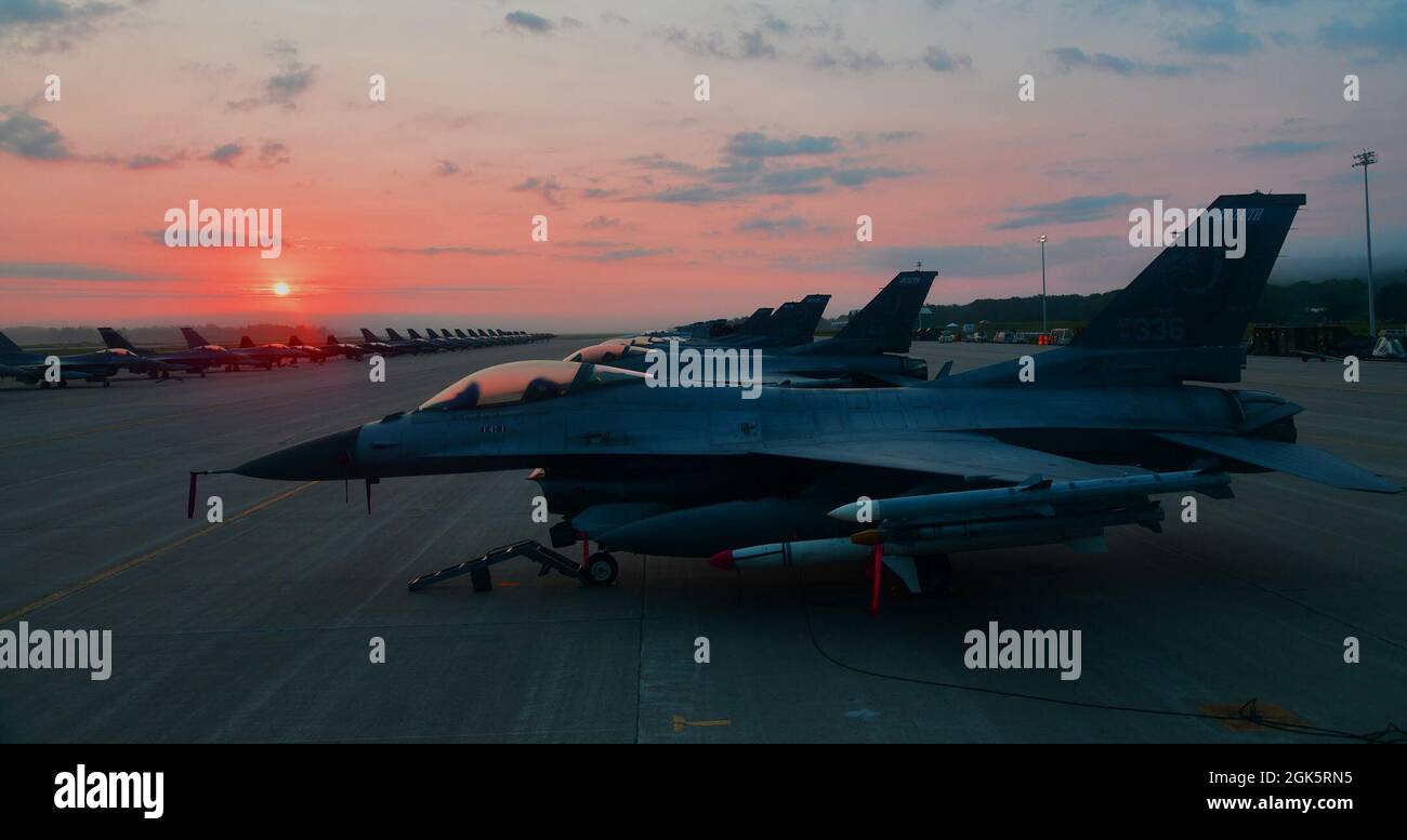 The sun rises at Volk Field Air National Guard Base, Wisconsin on ...