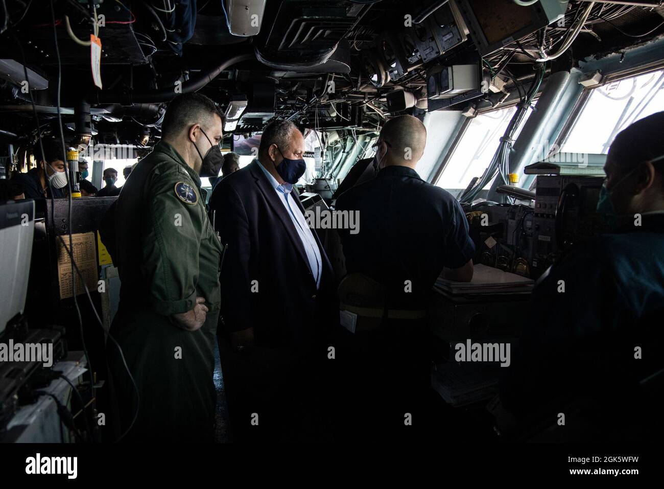 U.S. Secretary of the Navy Carlos Del Toro, receives a tour of the bridge of the USS Kearsarge during Large Scale Exercise (LSE) 2021, off the coast of North Carolina, Aug. 10, 2021. II MEF is a maritime force inextricably linked to our Navy partners in U.S. 6th and 2nd Fleets, creating mutual interdependence with our Fleet counterparts leverages our collective capabilities and increases maritime lethality. LSE 2021 merges live and synthetic training capabilities to create an intense, robust training environment. Stock Photo