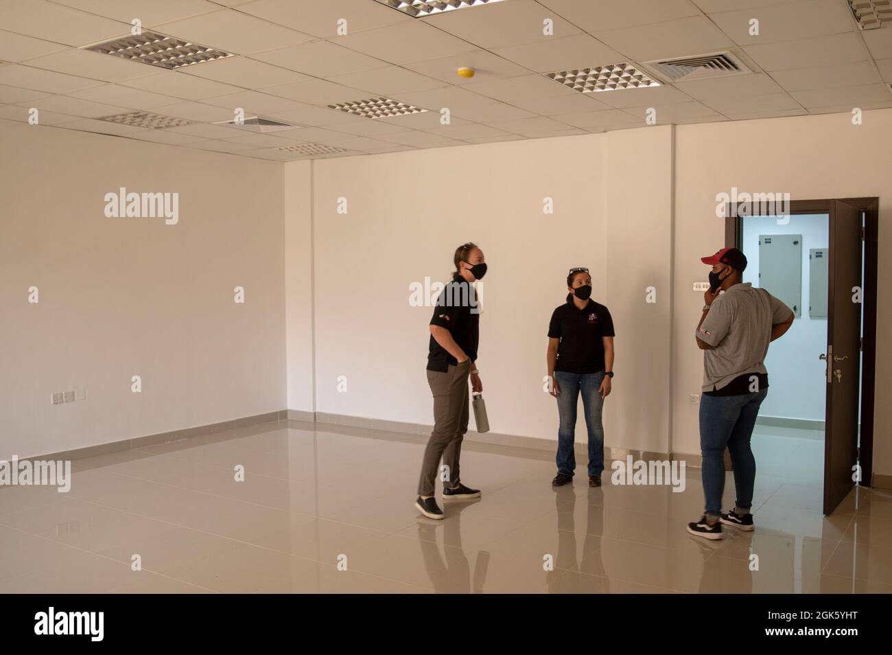 From left, U.S. Army Capt. Taylor Alton, the Camp Arifjan Veterinary