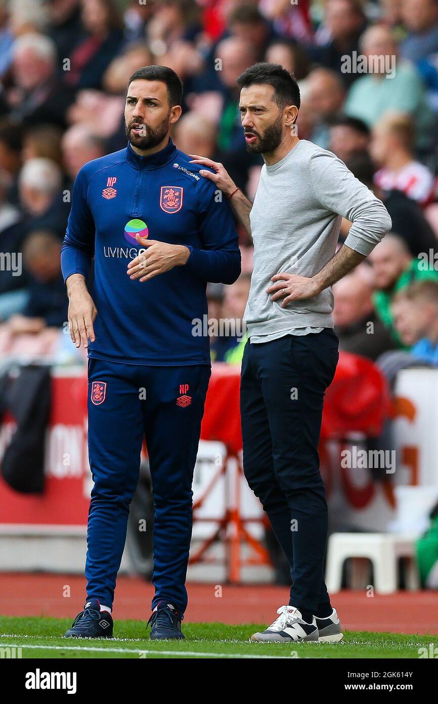 Huddersfield Town manager Carlos Corberan (R) during the Sky Bet  Championship match at the Bet365 Stadium, Stoke. Picture date: Saturday  September 11, 2021 Stock Photo - Alamy