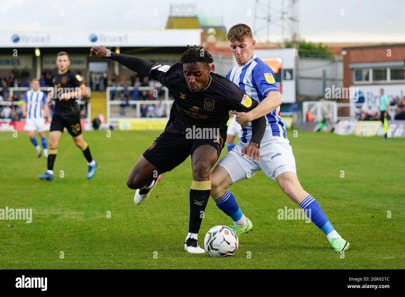 Crewe’s Kayne Ramsey competes for the ball with Hartlepool's Matty Daly  Picture by Steve Flynn/AHPIX.com, Football: Carabao Cup 1st Round match Hartl Stock Photo