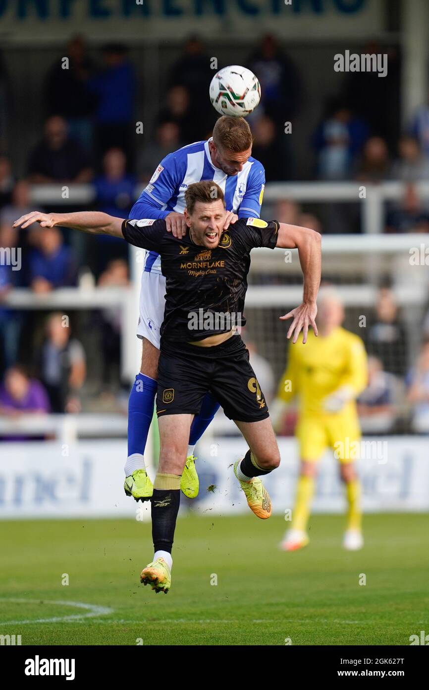 Hartlepool's Gary Liddle competes for a header with Crewe’s Chris Porter Picture by Steve Flynn/AHPIX.com, Football: Carabao Cup 1st Round match Hartl Stock Photo