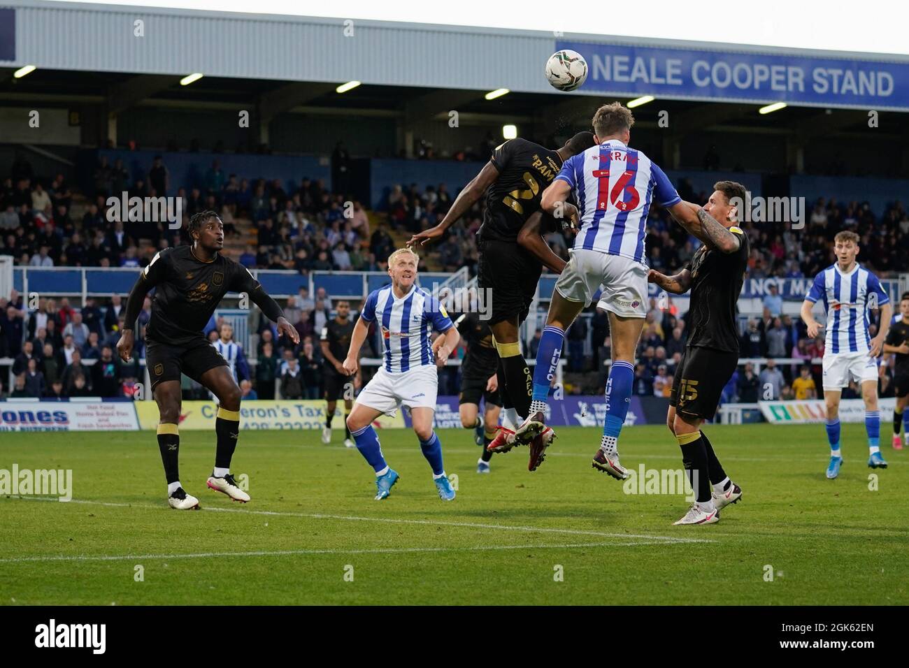 Hartlepool's Neill Byrne competes for a header with Crewe's Kayne Ramsay Picture by Steve Flynn/AHPIX.com, Football: Carabao Cup 1st Round match Hartl Stock Photo