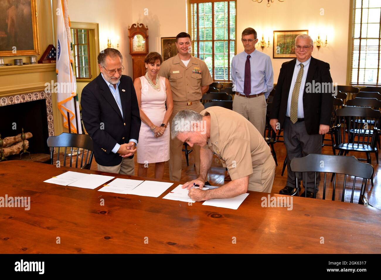 COLTS NECK, New Jersey – Capt. Ed Callahan, Naval Weapons Station Earle  Commanding Officer and Colts Neck Mayor Michael Viola sign a Memorandum of  Understanding regarding the use of the Navy Wastewater