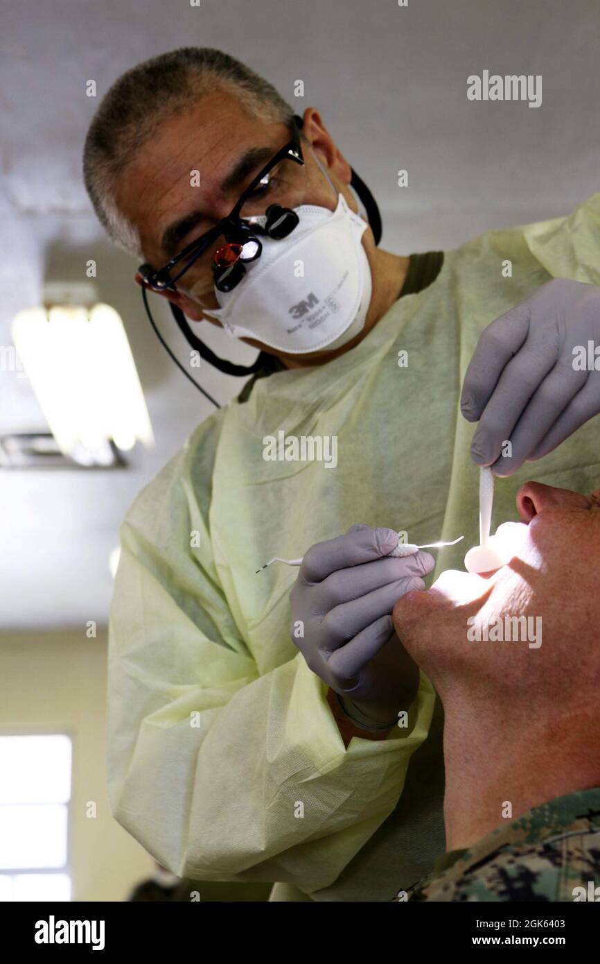 U.S. Navy Capt. Albert Fu, a dentist with the 4th Dental Battalion, 4th