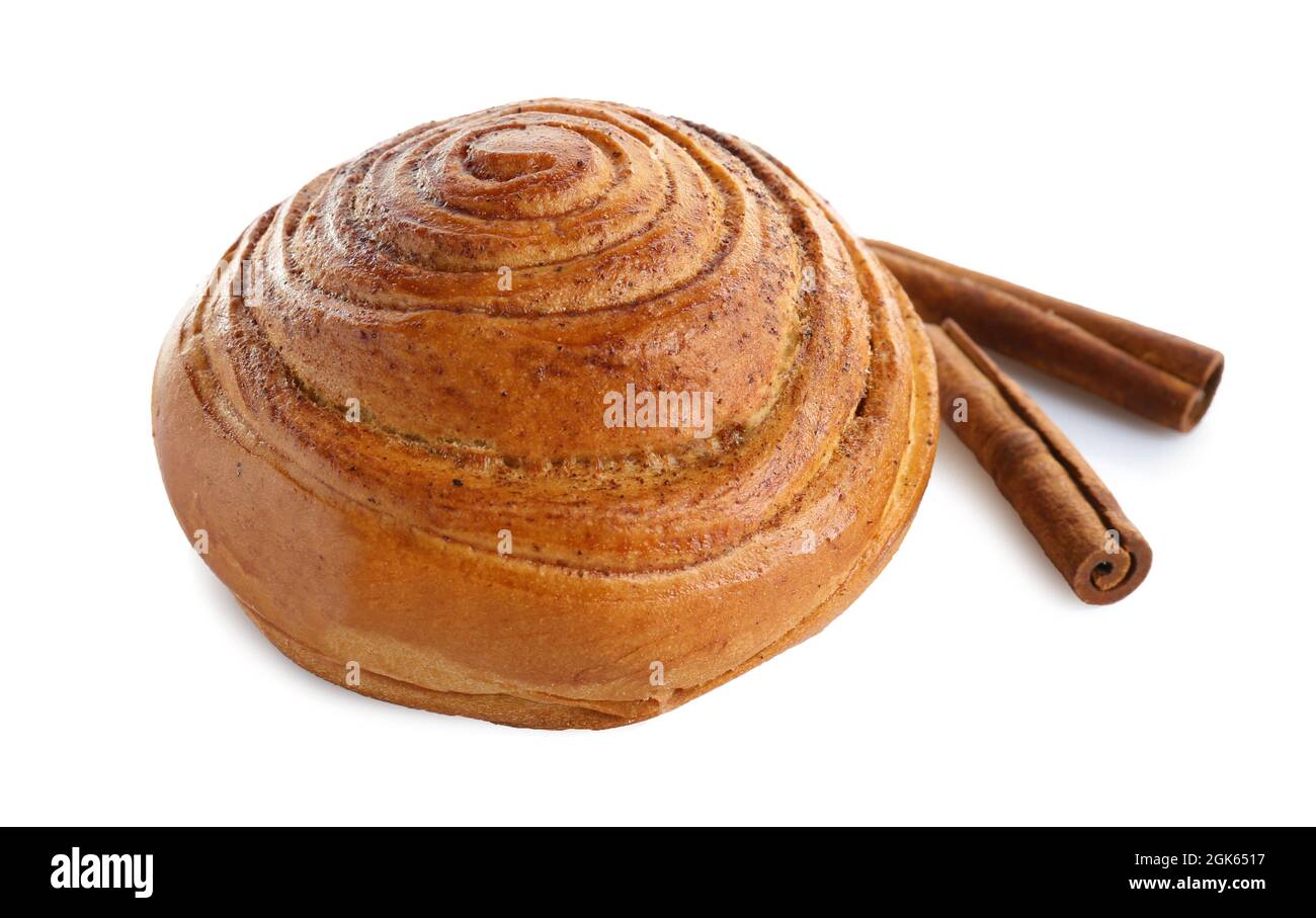 Sweet cinnamon roll and sticks on white background Stock Photo - Alamy