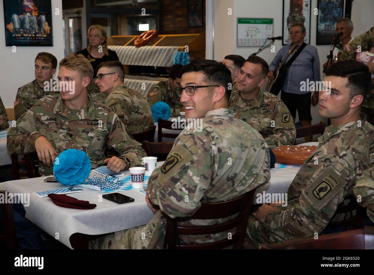 U.S. Army Soldiers attend a reception following the awards ceremony of ...