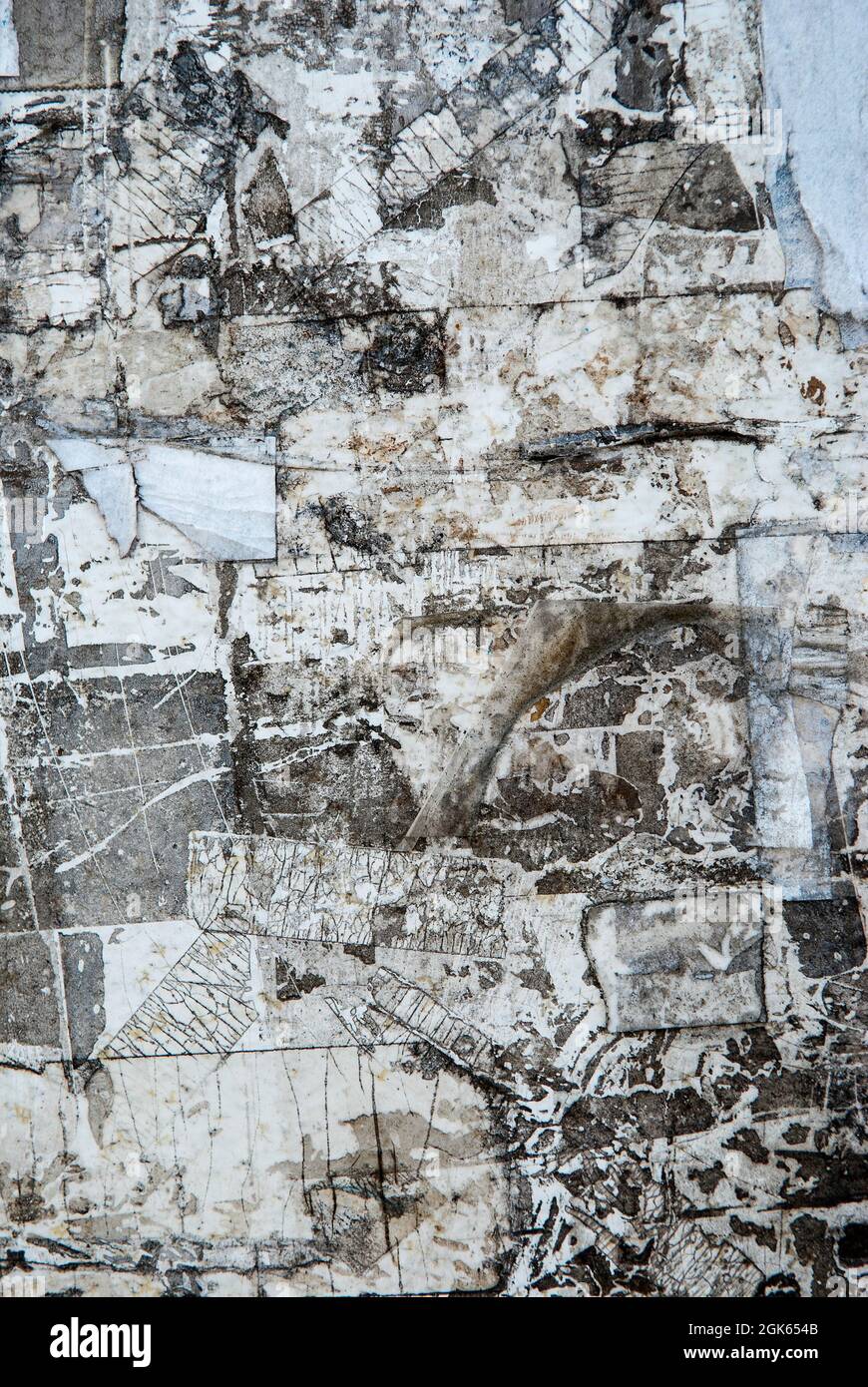 Torn Poster Paper Wall Texture Pattern as Urban Background Vintage. Stock Photo