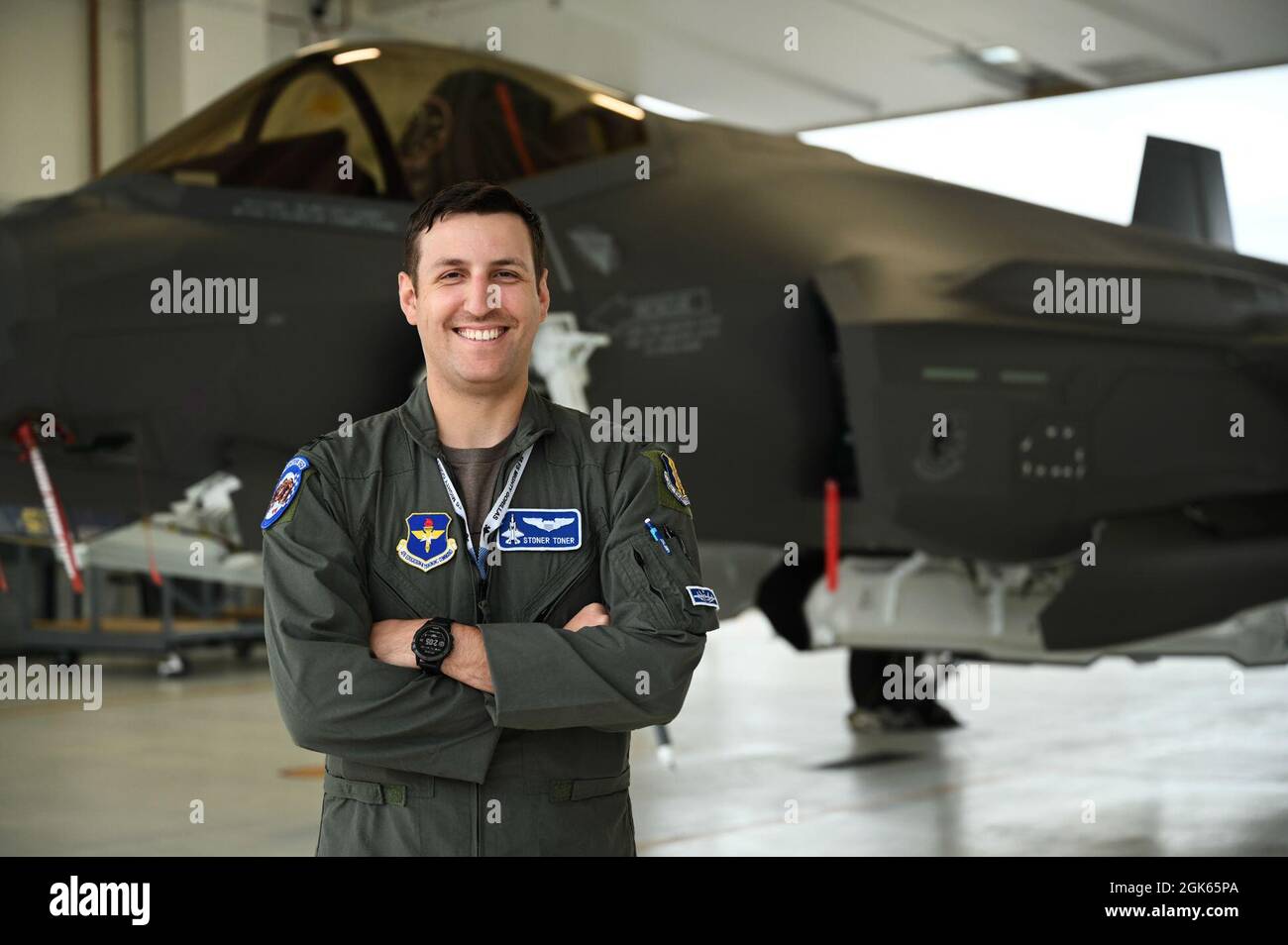 U.S. Air Force Capt. John Toner, 58th Fighter Squadron F-35A Lighting II  student pilot, poses for a portrait Aug. 12, 2021, at Eielson Air Force  Base, Alaska. Toner went to the University
