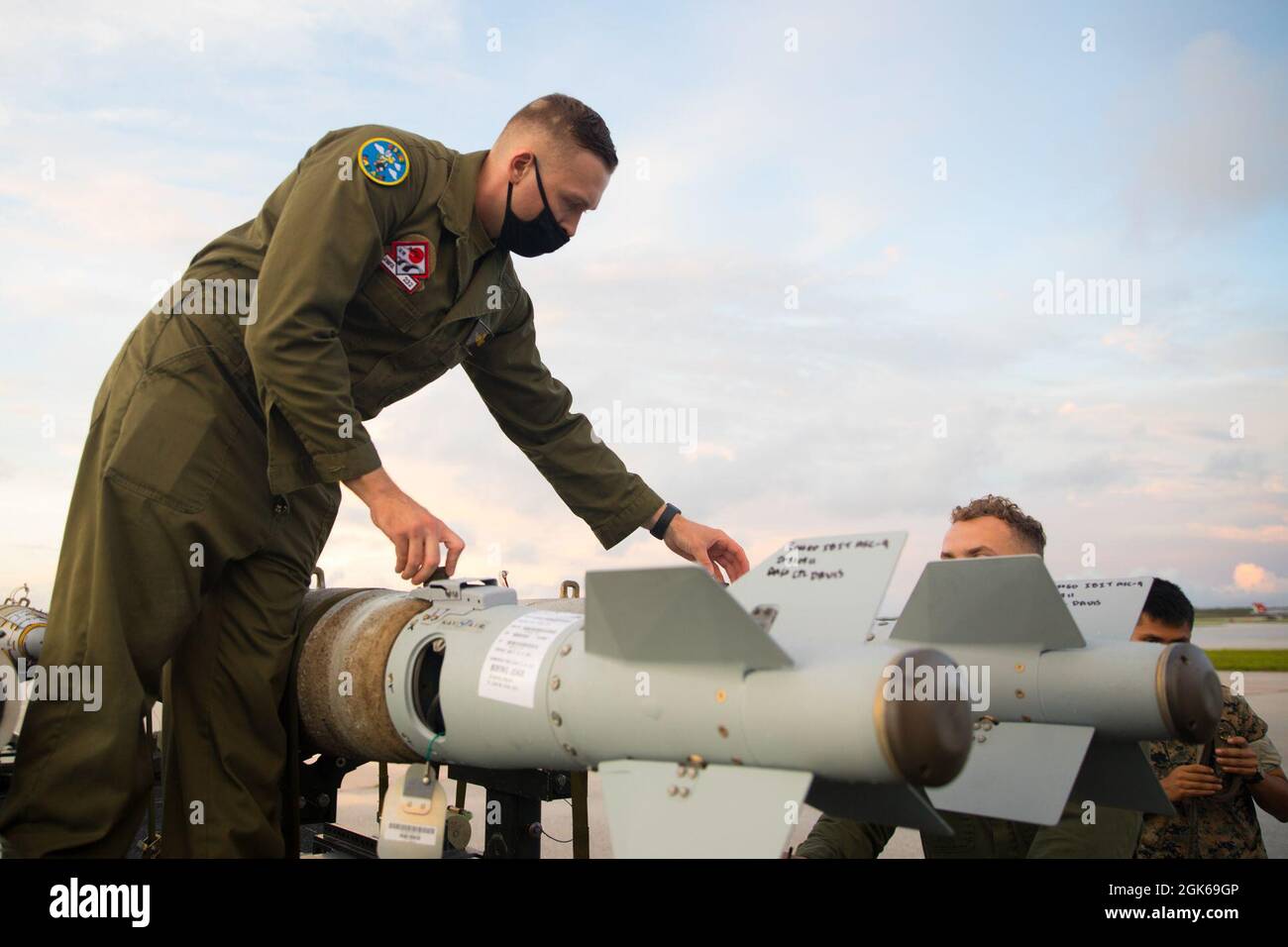 U.S. Marine Corps Staff Sgt. Alex Pratt, an aircraft ordnance technician with Marine Fighter Attack Squadron (VMFA) 232 inspects a GBU-38 Joint Direct Attack Munition at Andersen Air Force Base, Guam, Aug. 13, 2021. VMFA-232 deployed to Andersen Air Force Base, Guam as part of the Aviation Training Relocation program, which is designed to increase operational readiness while reducing the impacts of training activities. Stock Photo