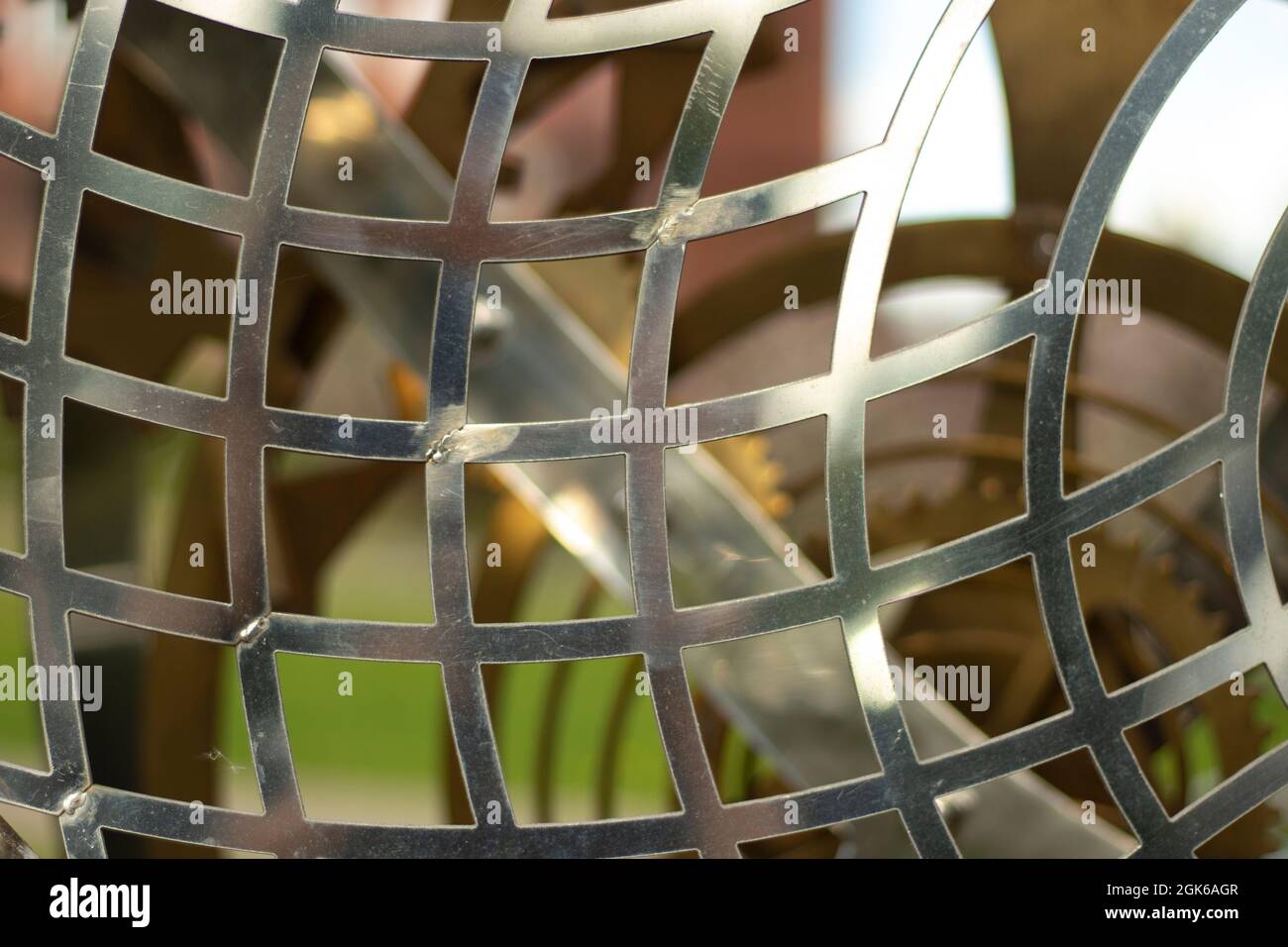 Metal mesh made of steel. An element of steel structure. Beautiful