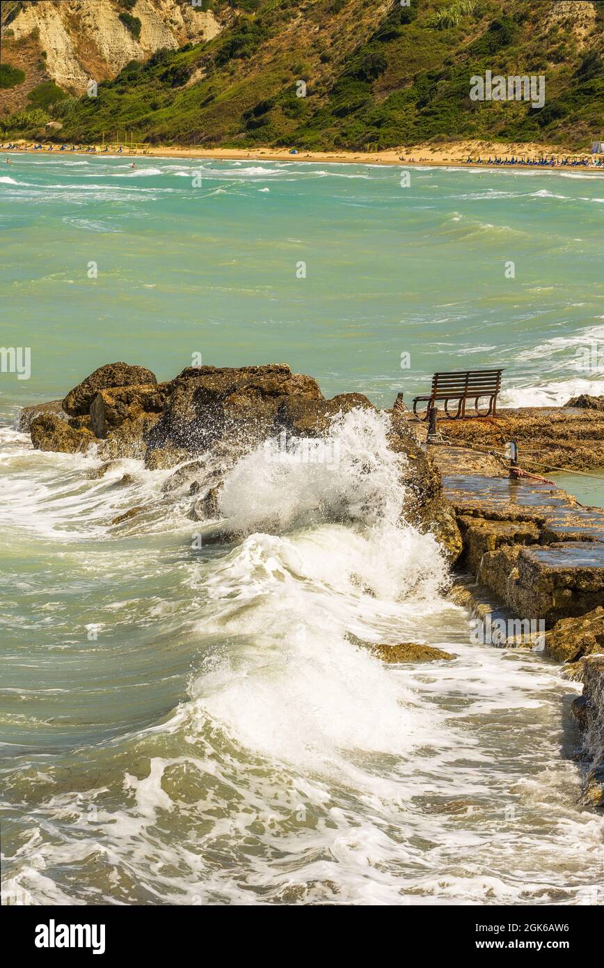 Coastal views of crashing waves rugged rocks tidal surges sea swells lapping waves Stock Photo