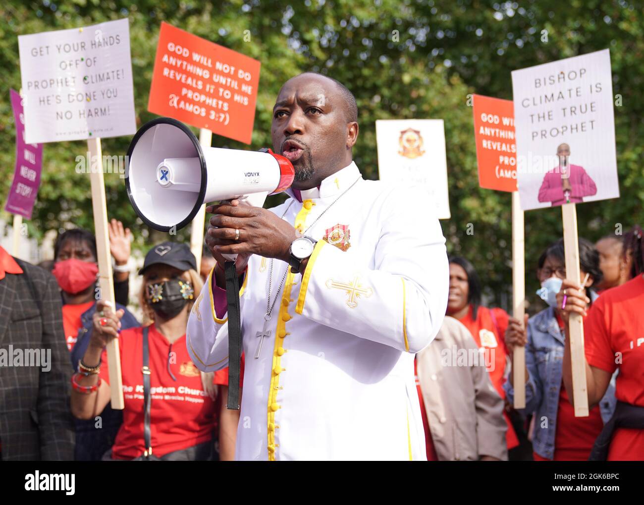 Bishop Climate Wiseman, 46, speaks to his supporters outside Inner London Crown Court, where he is charged with fraud and unfair trading offences over the selling of 'plague protection kits' with claims a mixture made from oil and red string, was a cure for Covid-19. Picture date: Monday September 13, 2021. Stock Photo