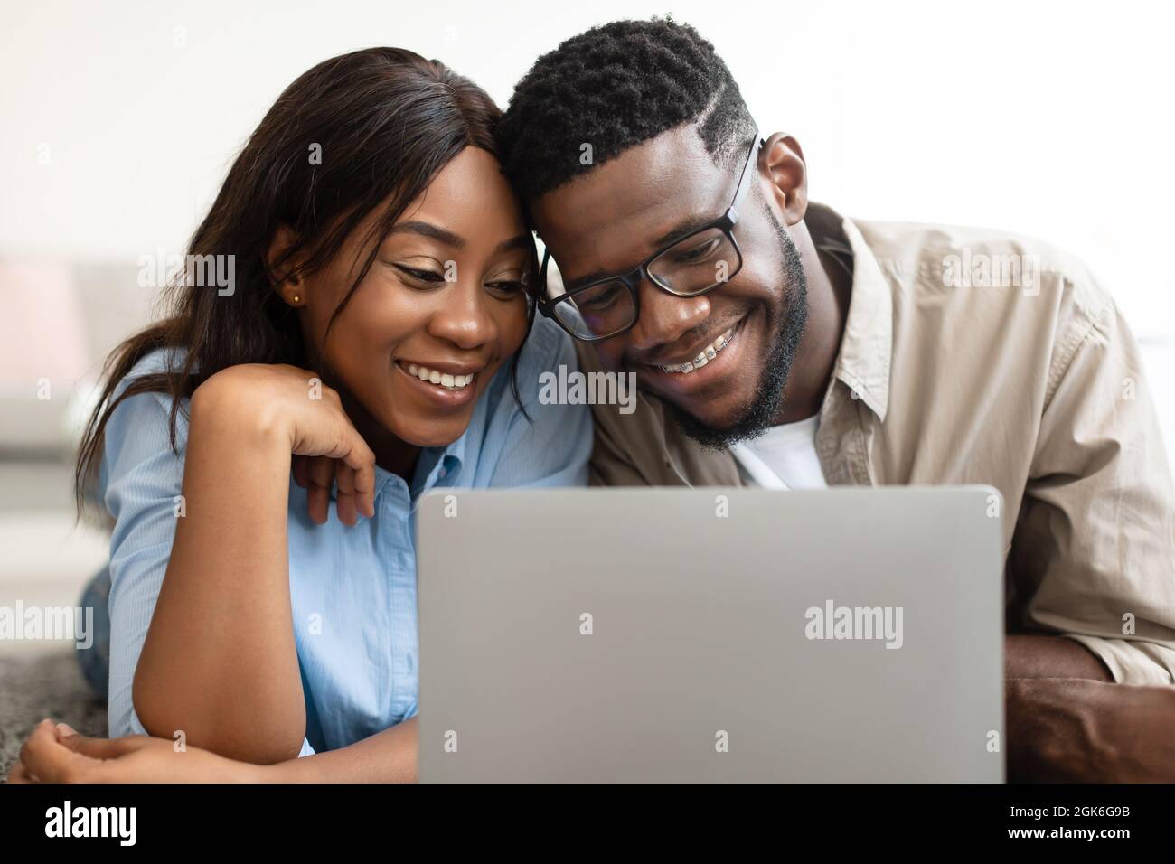 Portrait of African American couple using personal computer Stock Photo ...