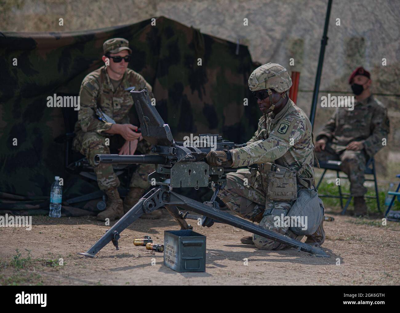 A U.S. Army paratrooper assigned to the 173rd Airborne Brigade executes a functions check on an MK19 Grenade Launcher during Expert Infantryman Badge (EIB) / Expert Soldier Badge (ESB) testing on August, 15 2021 at Caserma Del Din, Italy. Earning the coveted EIB and ESB displays Soldiers' proficiency in their specialty and sets them apart from their peers.    The 173rd Airborne Brigade is the U.S. Army’s Contingency Response Force in Europe, providing rapidly deployable forces to the United States European, Africa and Central Command areas of responsibility. Forward deployable across Italy and Stock Photo